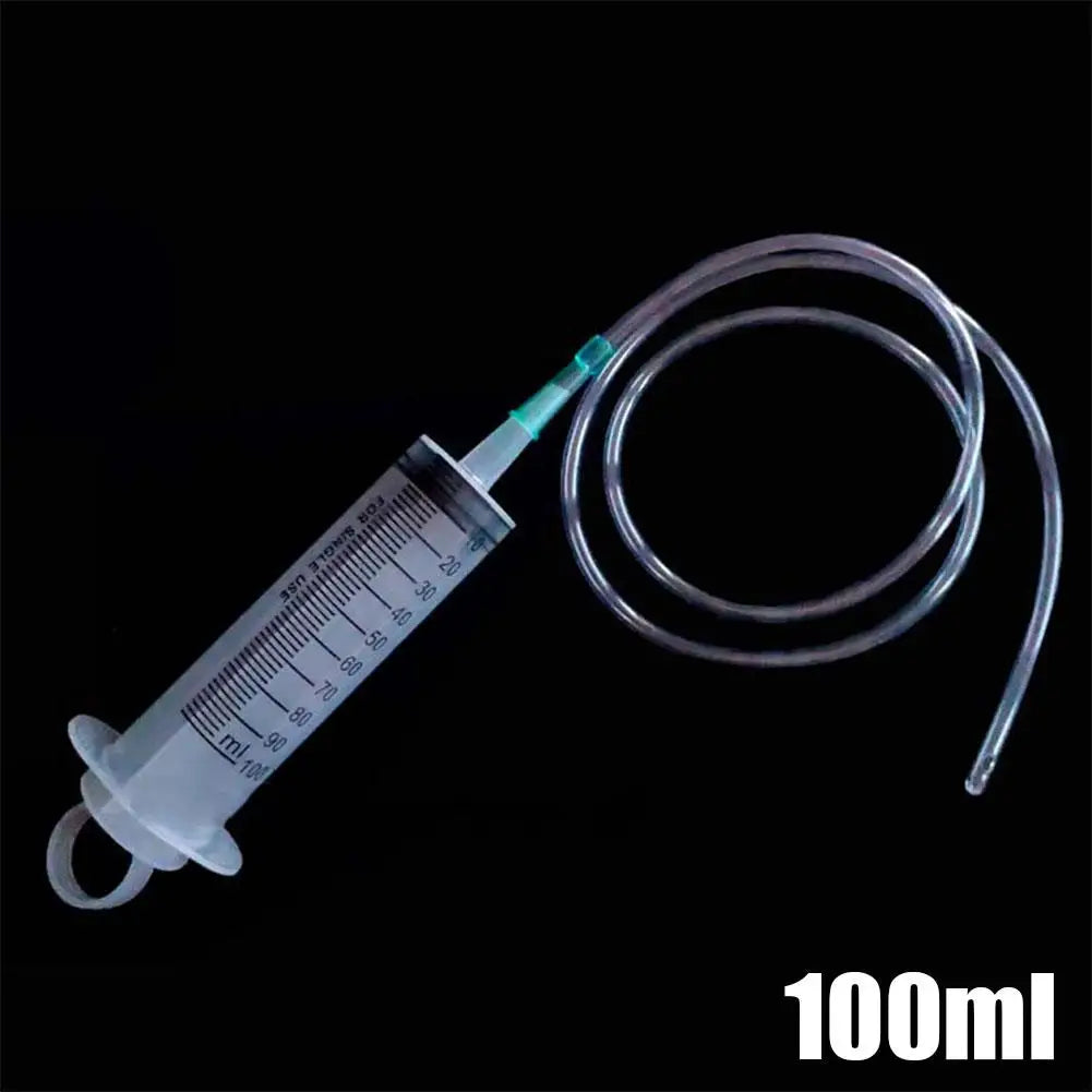 Syringe-with-attached-tubing