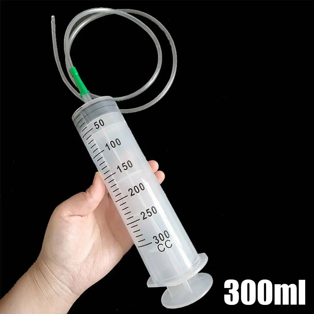 Syringe-with-attached-tubing