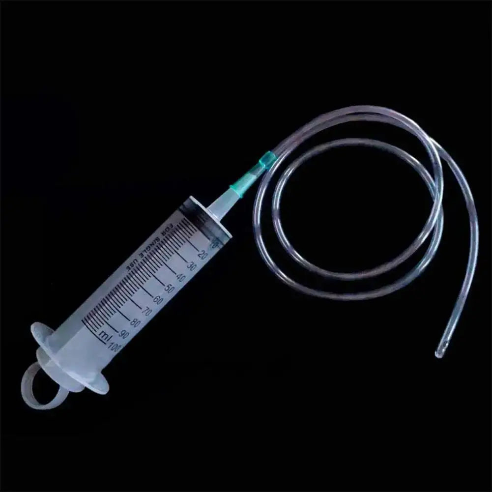 Syringe-with-attached-tubing